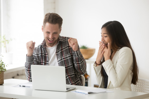 diverse-amazed-colleagues-excited-by-online-win-result-achievement_1163-4618